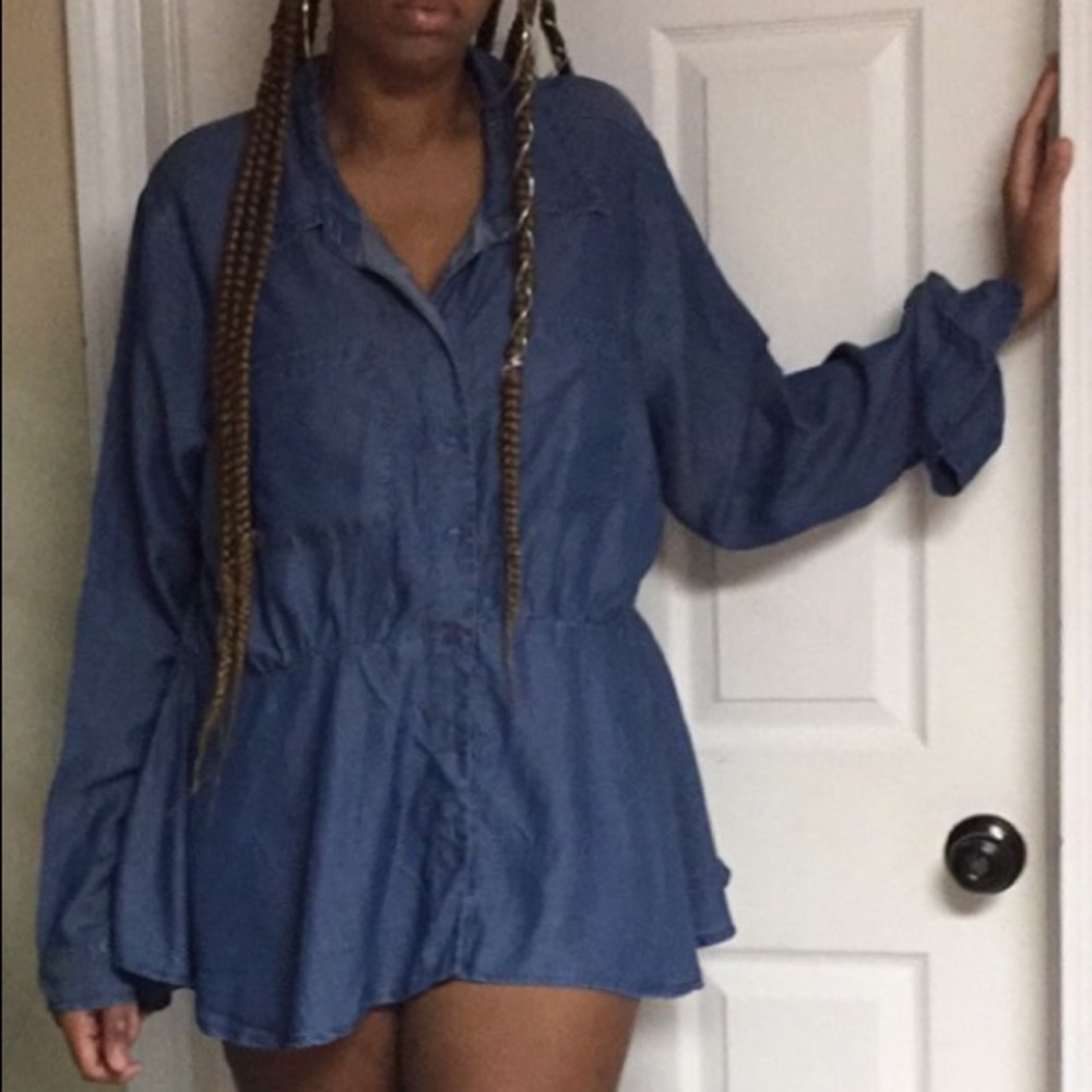 Medium to dark blue denim shirt.